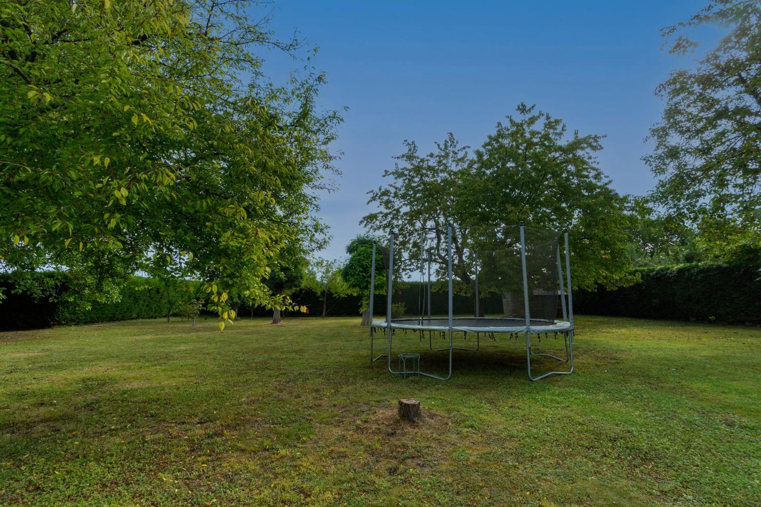 Garden in France with trampoline