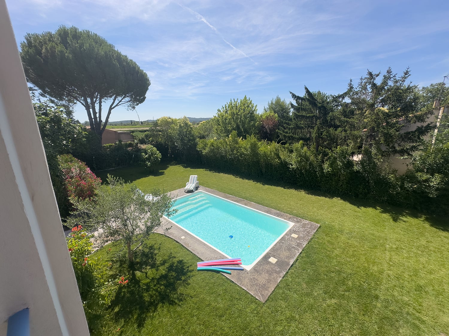 Private pool with lawned garden