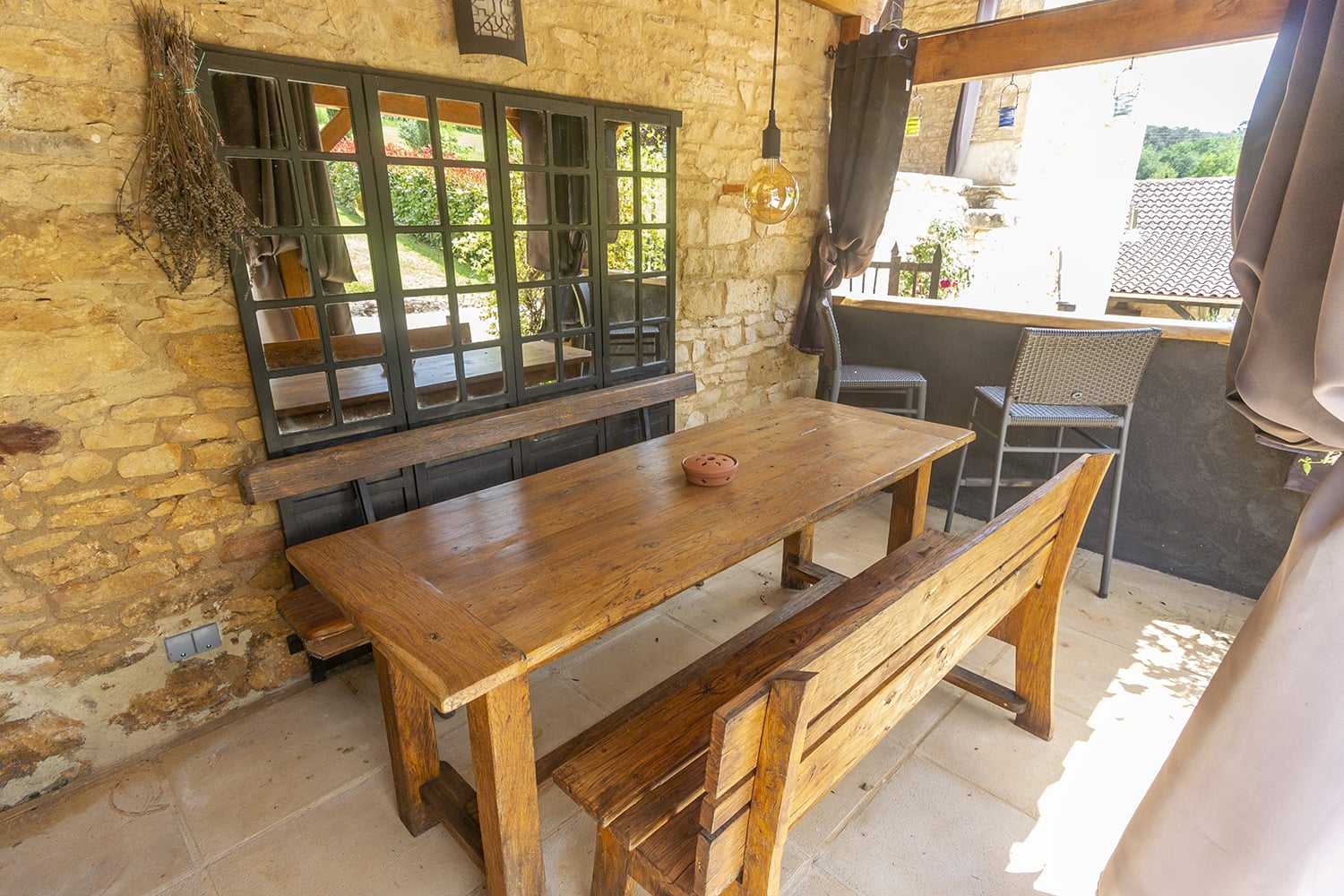 Shaded dining terrace | Holiday home in Lot