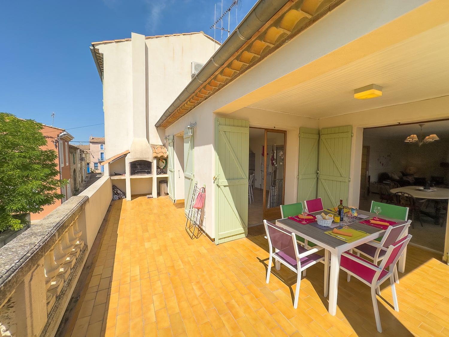 Shaded dining terrace with BBQ