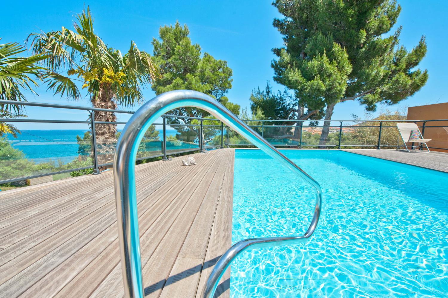 Private heated pool with sea view