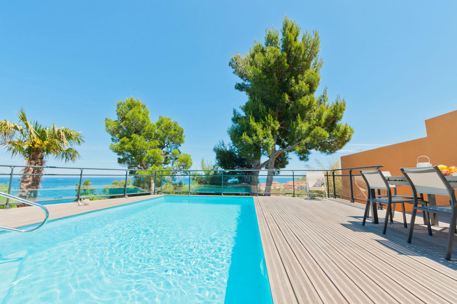 Private heated pool with sea view