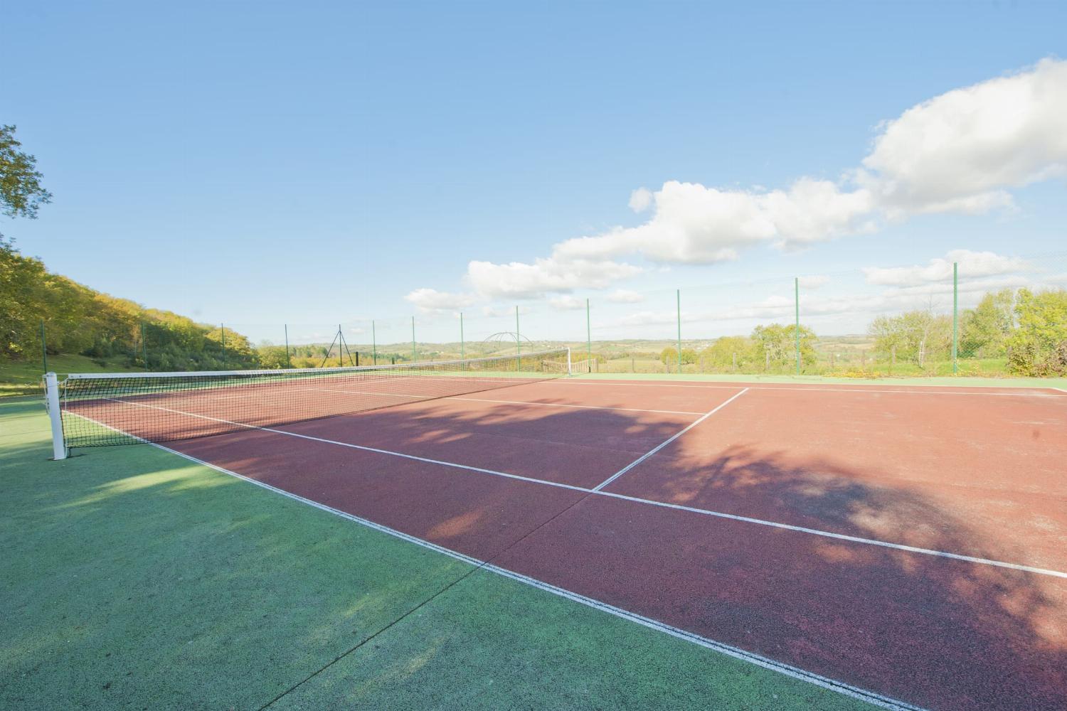 Private tennis court in château grounds